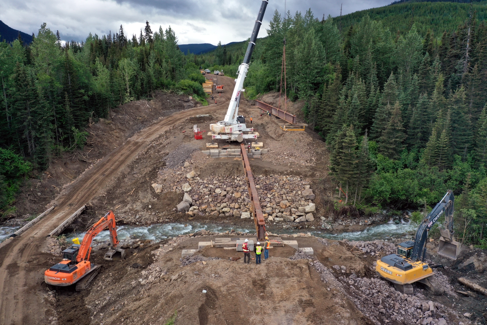 Dawson Road Maintenance replacing a bridge on Babine Lake Road after the washout